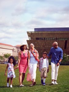 African-American family walking on the National Mall near the National Museum of African American History and Culture